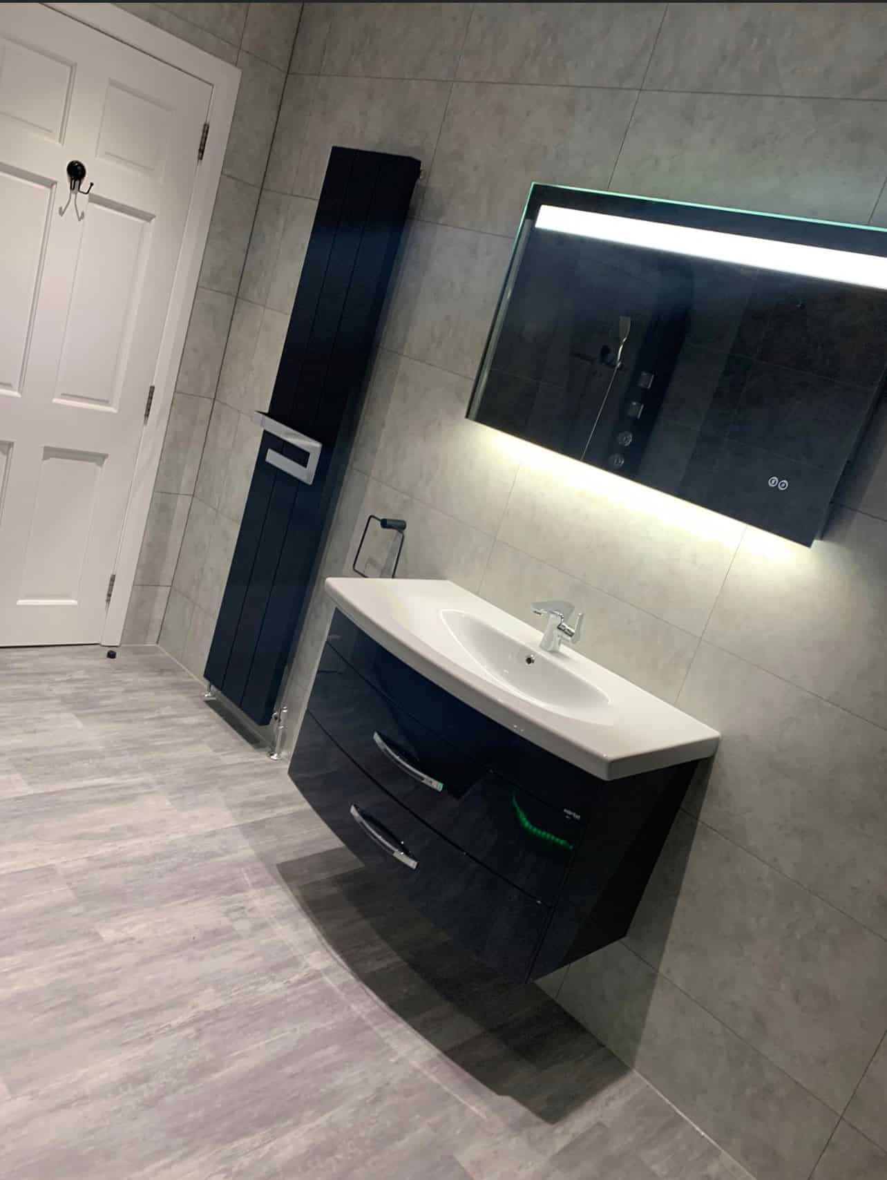 Photo showing a newly renovated bathroom using Dumawall tiles